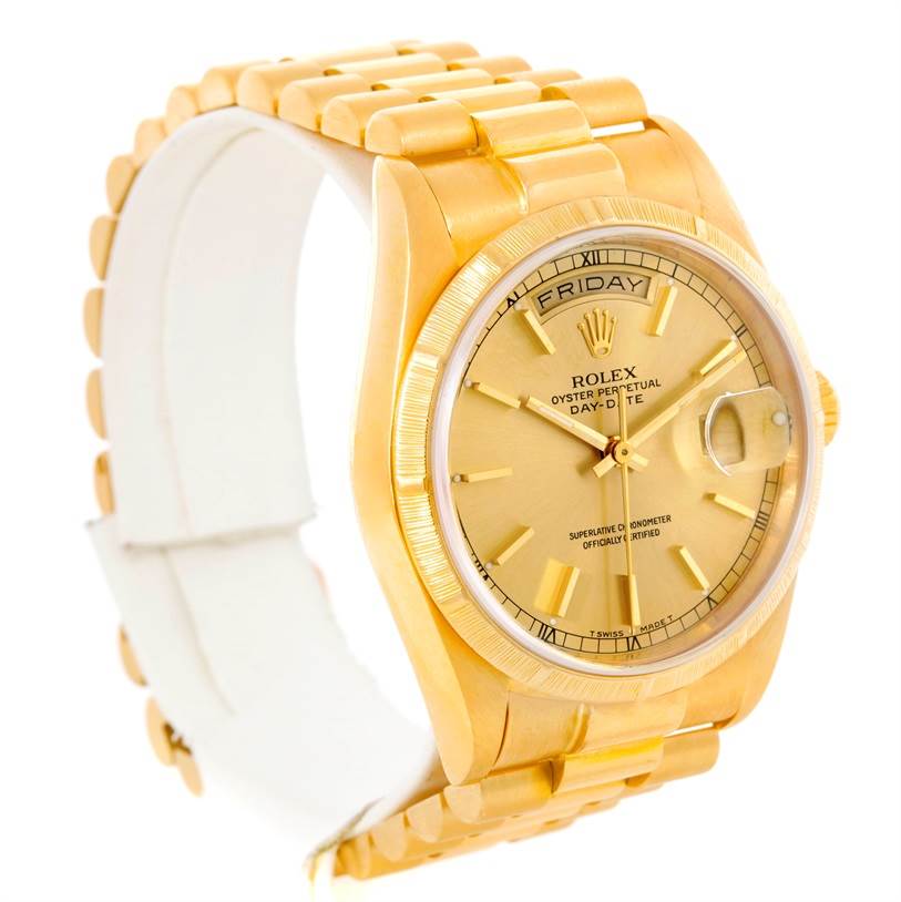 This image shows a gold Rolex President 18248 Men's Yellow Gold Champagne Dial 18248 Men's Yellow Gold Champagne Dial model watch at a three-quarter angle, displaying the face, bezel, and part of the bracelet.