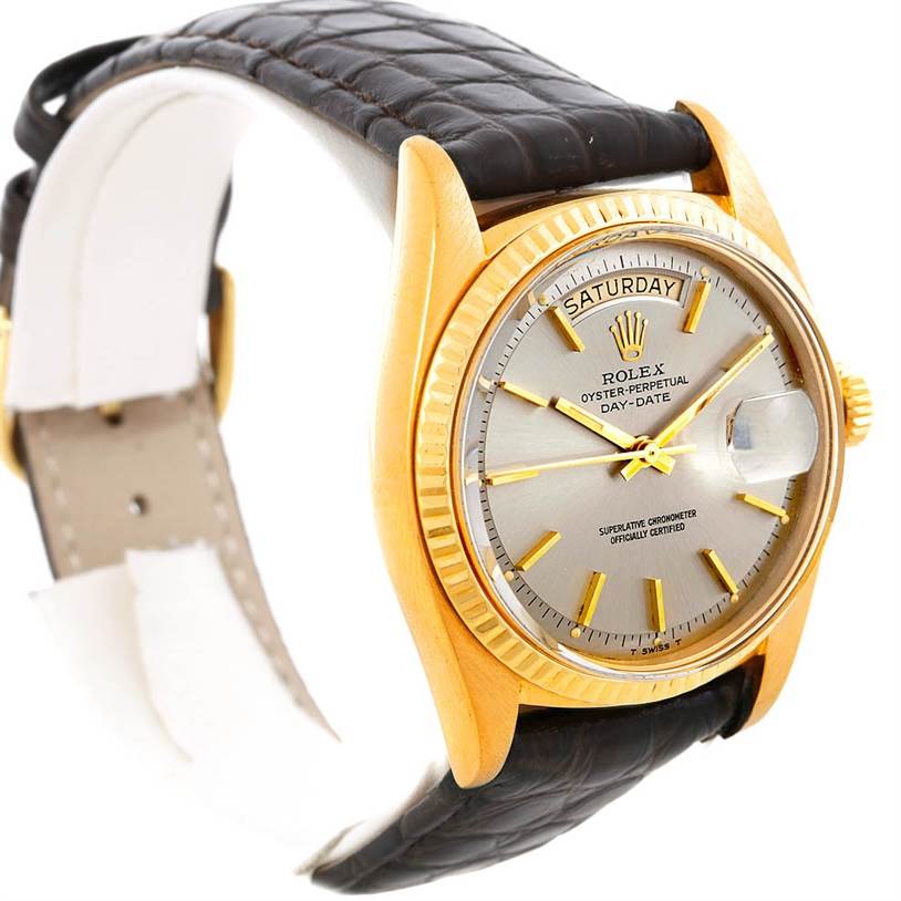 The Rolex President 1803 Men's Yellow Gold Grey Dial 1803 Men's Yellow Gold Grey Dial model watch is shown at a slight angle displaying its gold case, dial, bezel, crown, and leather strap.