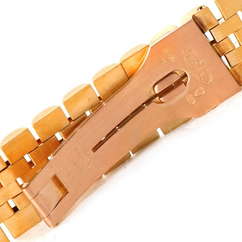 This image shows the clasp and part of the bracelet of a Rolex President 1601 Men
s Yellow Gold Champagne Dial 1601 Men
s Yellow Gold Champagne Dial model watch.