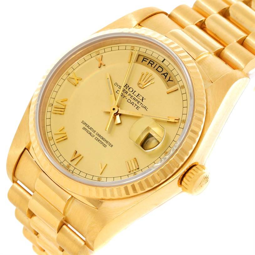 This Rolex President 18038 Men
s Yellow Gold Champagne Dial 18038 Men
s Yellow Gold Champagne Dial model watch is shown from an angled top view, featuring its gold bracelet, dial, and fluted bezel.