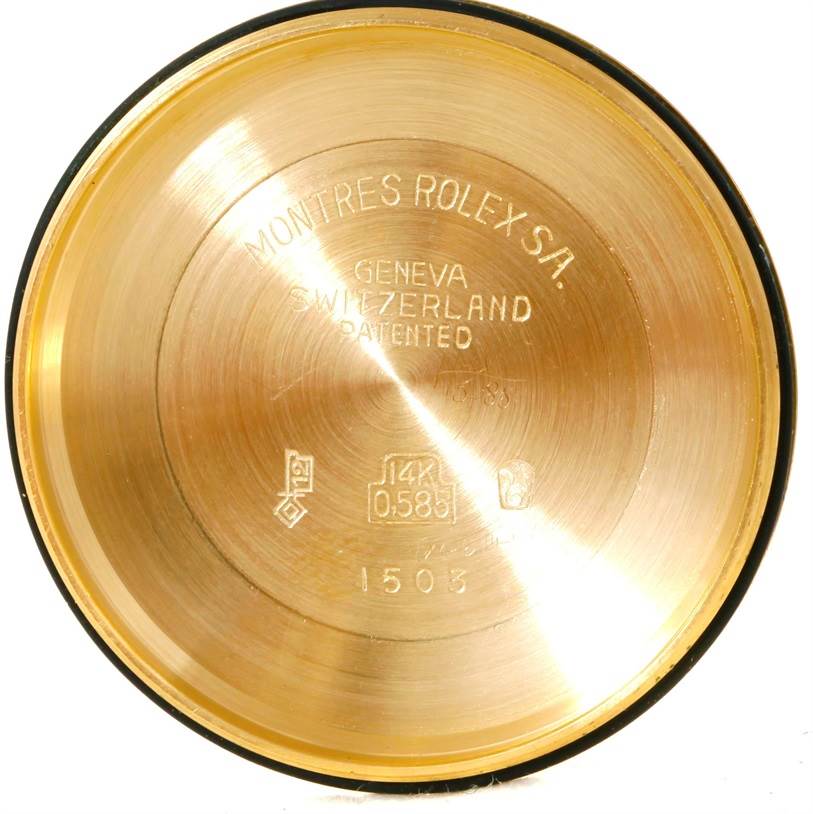 This image shows the inside case back of a Rolex President 1503 Men
s Yellow Gold Silver Dial 1503 Men
s Yellow Gold Silver Dial model watch, featuring inscriptions and hallmarks.