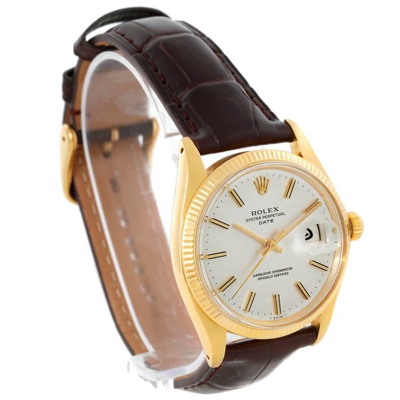 The Rolex President 1503 Men
s Yellow Gold Silver Dial 1503 Men
s Yellow Gold Silver Dial watch is shown at an angle displaying its dial, bezel, crown, and leather strap.