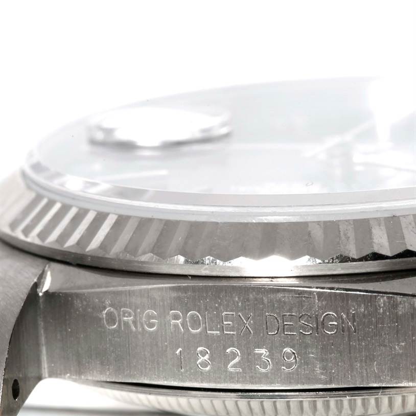 The image shows a close-up view of the side of a Rolex President 18239 Men's White Gold Blue Dial 18239 Men's White Gold Blue Dial watch, highlighting the fluted bezel and reference number 18239.