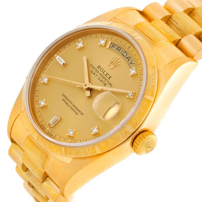 The image displays a Rolex President 18078 Men
s Yellow Gold Champagne Dial 18078 Men
s Yellow Gold Champagne Dial model watch at an angled close-up, showing the dial, day-date feature, crown, and bracelet.