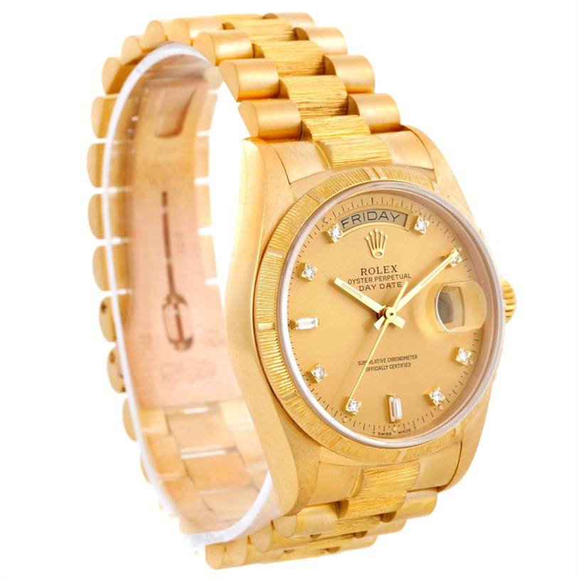 This image shows a Rolex President 18078 Men
s Yellow Gold Champagne Dial 18078 Men
s Yellow Gold Champagne Dial model watch at a slight angle, including its gold bracelet, bezel, and diamond hour markers.