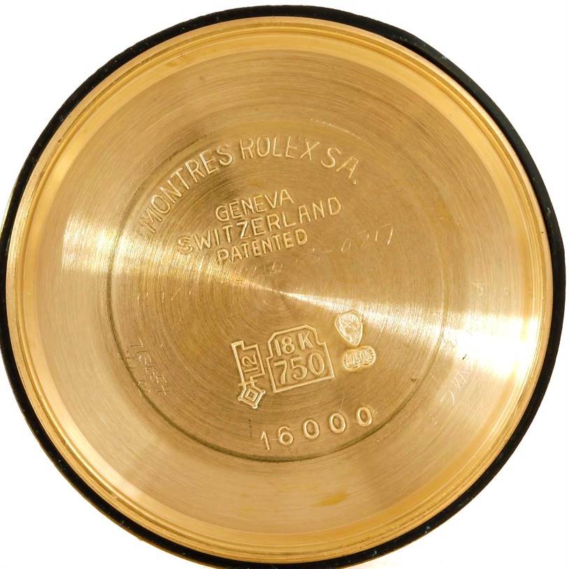 This image shows the inside case back of a Rolex President 16018 Men
s Yellow Gold Silver Dial 16018 Men
s Yellow Gold Silver Dial model, engraved with various markings and specifications.