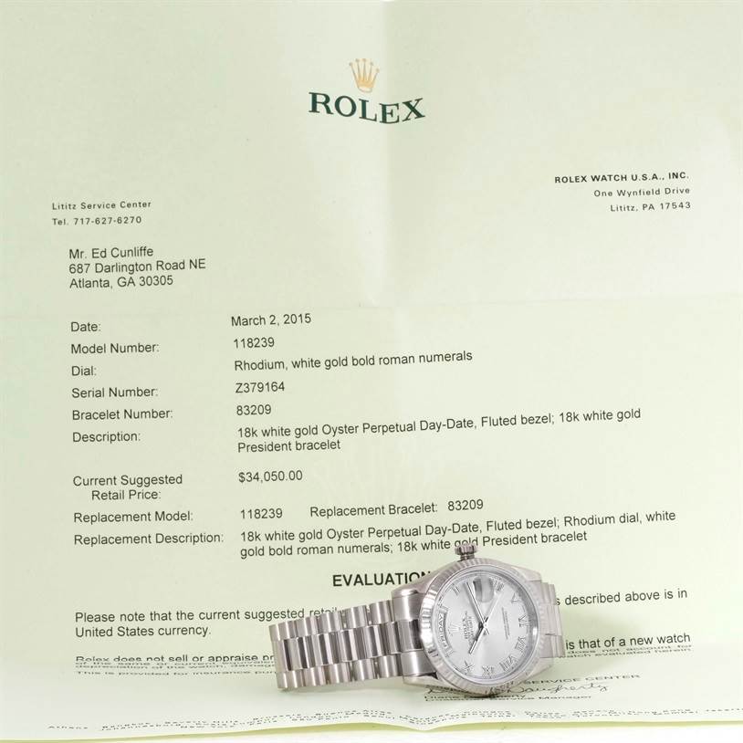 This image shows a President model Rolex watch laid flat on an official document with detailed specifications.