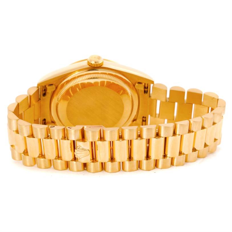 This image shows the backside and bracelet of a Rolex President 18238 Men
s Yellow Gold Champagne Dial 18238 Men
s Yellow Gold Champagne Dial model watch.