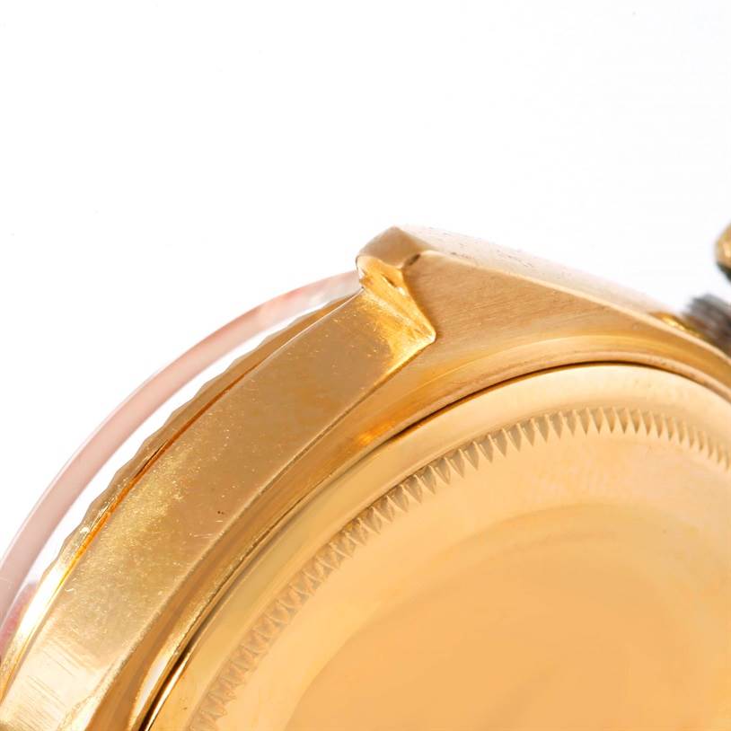 The image shows a close-up of the gold case and bezel of the Rolex President 1803 Men
s Yellow Gold Silver Dial 1803 Men
s Yellow Gold Silver Dial model watch.