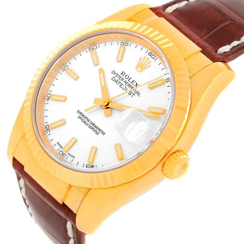 The image shows a close-up, angled view of a Rolex President 116138 Men's Yellow Gold White Dial 116138 Men's Yellow Gold White Dial model watch, highlighting its face, bezel, crown, and leather strap.