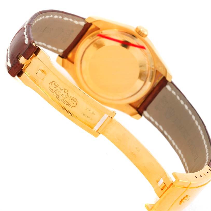 The image shows the Rolex President 116138 Men's Yellow Gold White Dial 116138 Men's Yellow Gold White Dial watch from the back, highlighting the clasp and part of the leather strap.