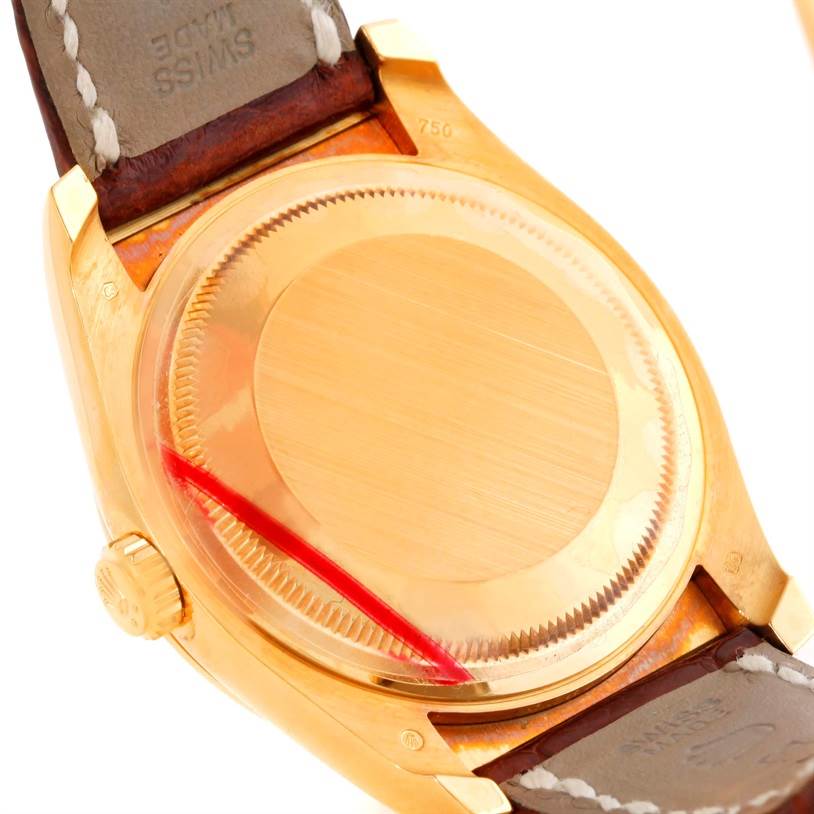 This image shows the back casing and strap connection of a Rolex President 116138 Men's Yellow Gold White Dial 116138 Men's Yellow Gold White Dial model watch.
