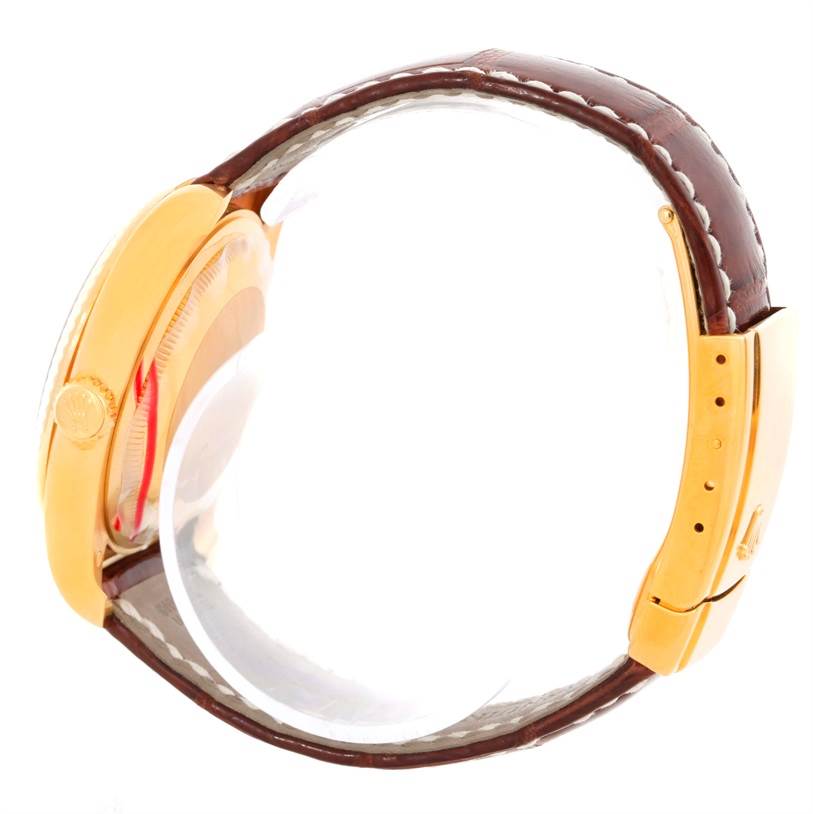 The image shows a side view of a Rolex President 116138 Men's Yellow Gold White Dial 116138 Men's Yellow Gold White Dial watch, highlighting the crown, case, and brown leather strap with gold clasp.