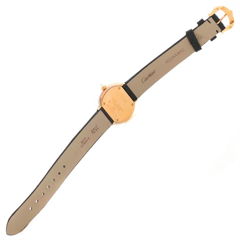 This image shows the back of a Cartier Trinity W200246 Women's Yellow Gold Beige Dial W200246 Women's Yellow Gold Beige Dial model watch laid flat, clearly displaying its strap and caseback.