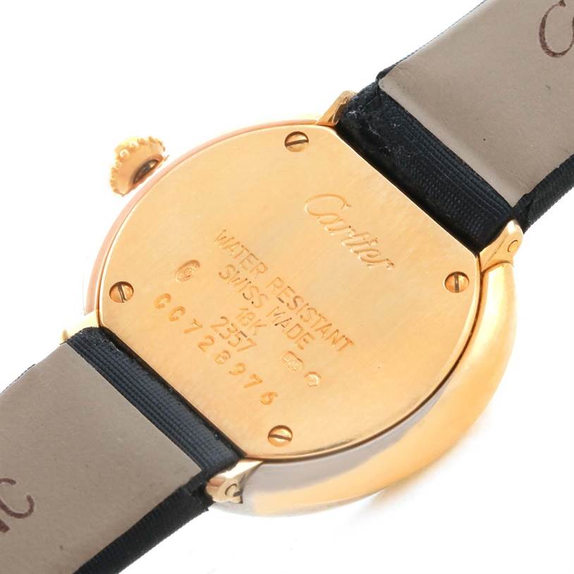 This image shows the back case and part of the strap of a Cartier Trinity W200246 Women's Yellow Gold Beige Dial W200246 Women's Yellow Gold Beige Dial watch.