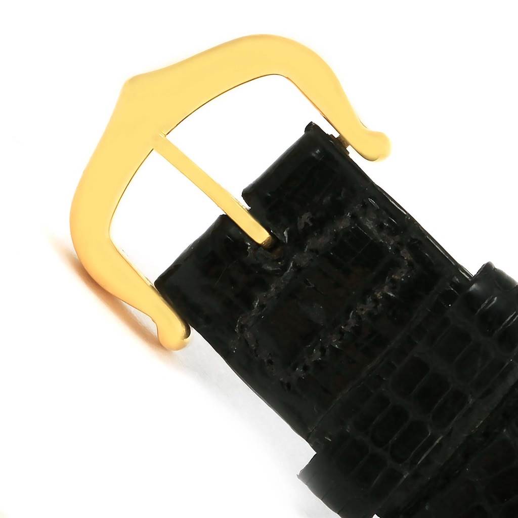 This image shows a close-up of the buckle and part of the strap of the Cartier Trinity W1514457 Yellow Gold White Dial W1514457 Yellow Gold White Dial watch.