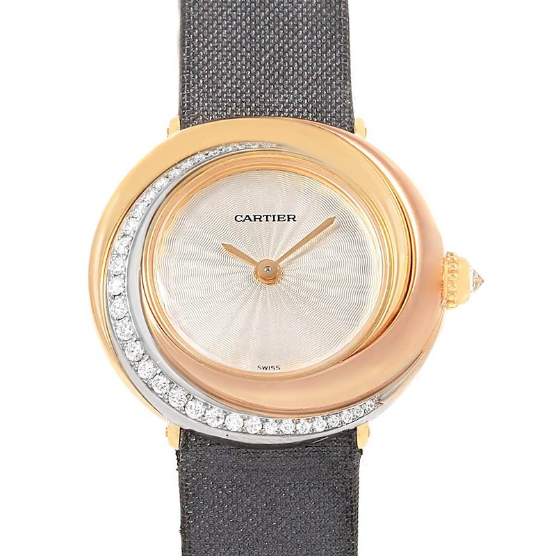 This image shows a front view of a Cartier Trinity model watch, highlighting its round dial, intricate bezel, and strap.