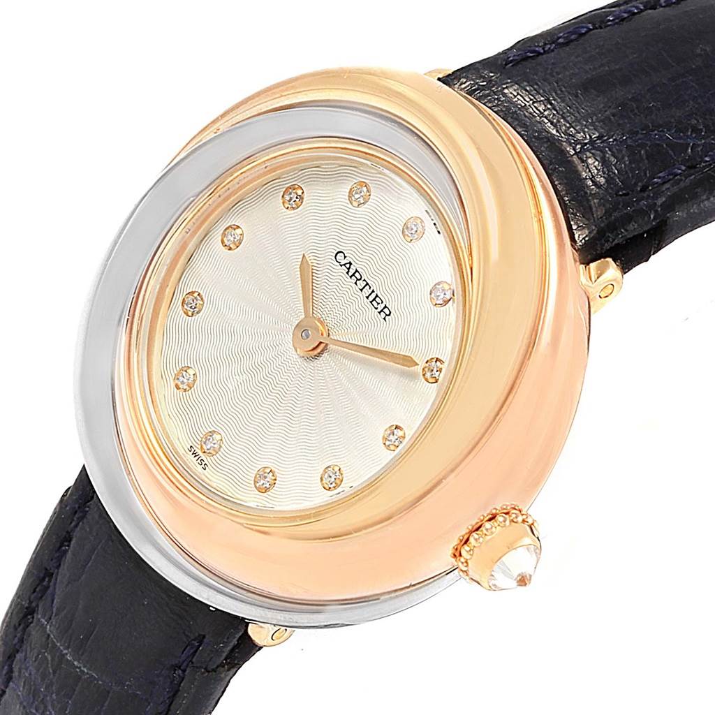 The Cartier Trinity W200246 Women's Yellow Gold Beige Dial W200246 Women's Yellow Gold Beige Dial model watch is shown at an angle highlighting its round face, gold bezel, crown, and leather strap.