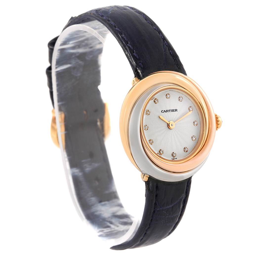 The image shows a Cartier Trinity W200246 Women's Yellow Gold Beige Dial W200246 Women's Yellow Gold Beige Dial model watch at an angle displaying its face, bezel, and leather strap.