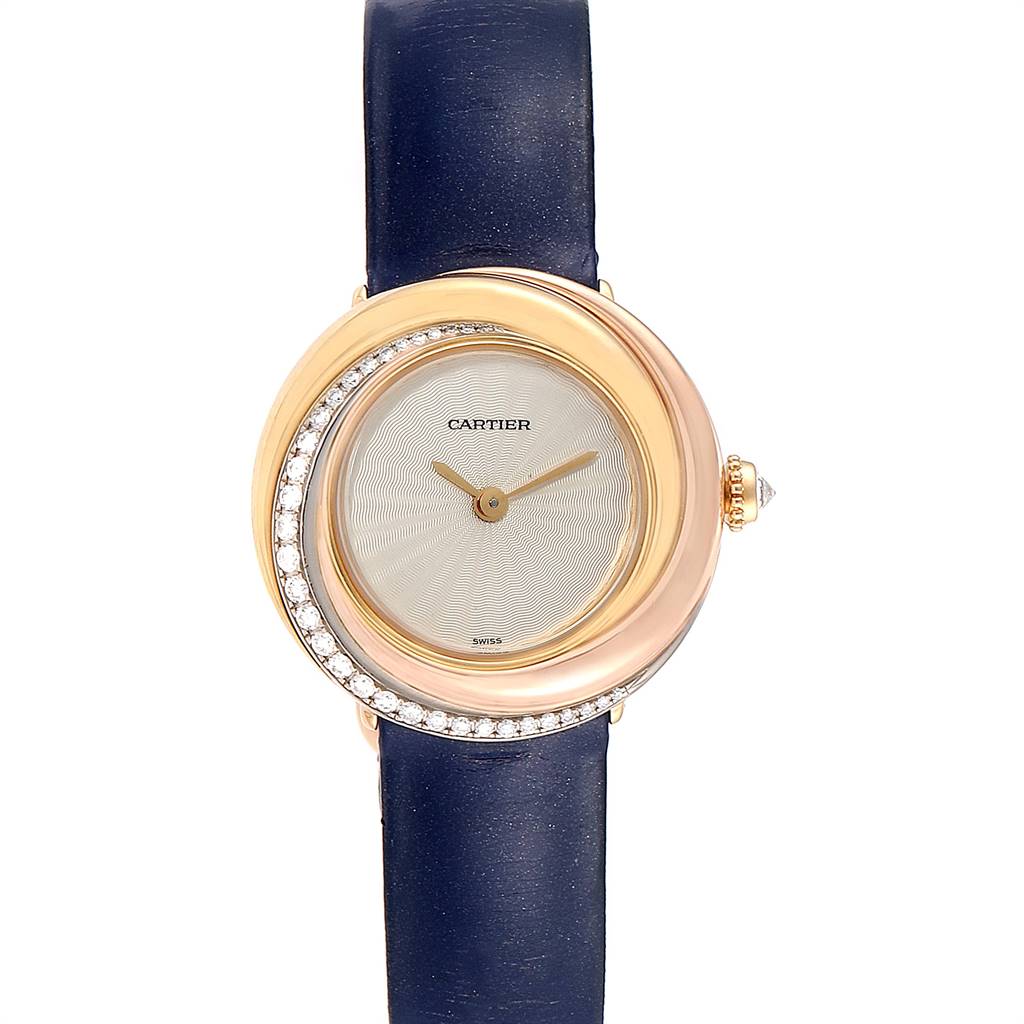 This image shows a Cartier Trinity WG200151 Women's Yellow Gold Beige Dial WG200151 Women's Yellow Gold Beige Dial model watch with a round, diamond-encrusted bezel and a blue leather strap viewed from the front.