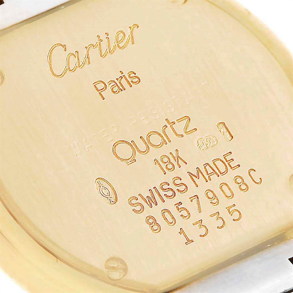 The image shows the back case of the Colisee model watch by Cartier, engraved with brand information and specifications.