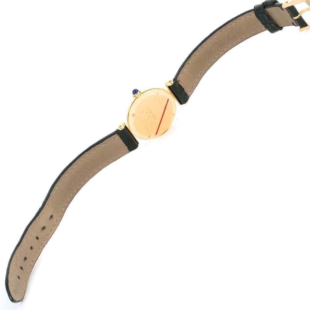 The image shows the back view of a Cartier Colisee Women's Yellow Gold Silver Dial Women's Yellow Gold Silver Dial watch lying flat, displaying the strap and case back.