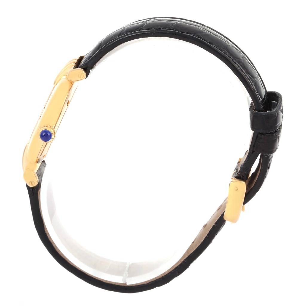 The image shows a side view of a Colisee model by Cartier, highlighting its case, crown, and black leather strap.