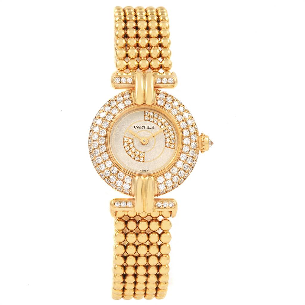 The image shows a front view of the Cartier Colisee  Women's Yellow Gold Silver Dial  Women's Yellow Gold Silver Dial model watch, highlighting its intricately designed face and gold bracelet.
