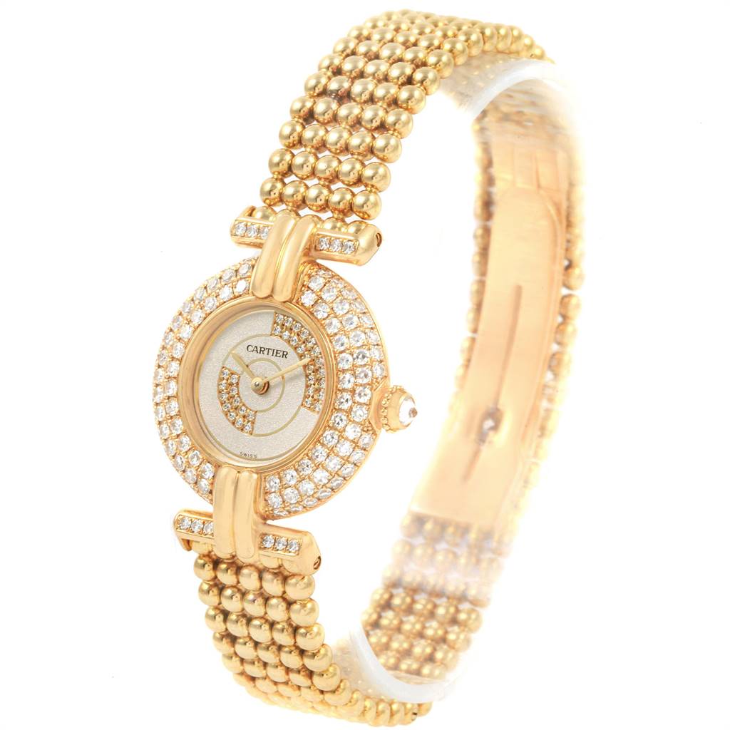 The image shows a Cartier Colisee  Women's Yellow Gold Silver Dial  Women's Yellow Gold Silver Dial model watch angled slightly to the right, showcasing its gold and diamond-encrusted case and band.