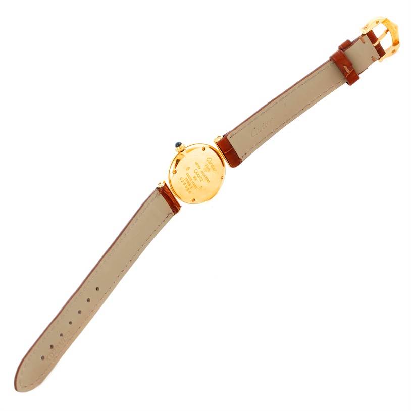 The image shows the back view of a Colisée model watch by Cartier, displaying the case back and leather straps.