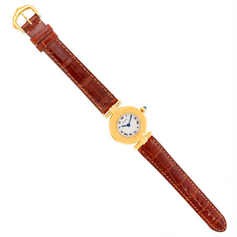 The Cartier Colisee C28086 Women's Yellow Gold Silver Dial C28086 Women's Yellow Gold Silver Dial watch is shown from above, displaying the full face, brown leather strap, and gold buckle.