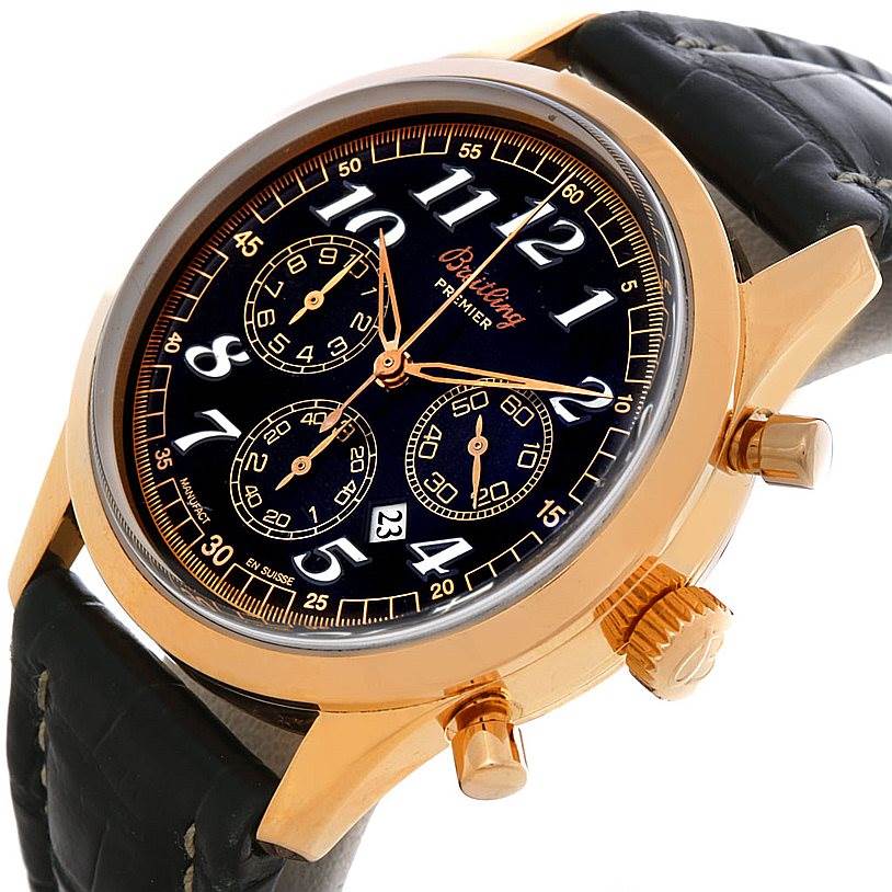 The image shows a close-up of a Breitling Premier H42035 Men's Rose Gold Black Dial H42035 Men's Rose Gold Black Dial watch face, highlighting its dial, sub-dials, crown, and case from an angled side view.