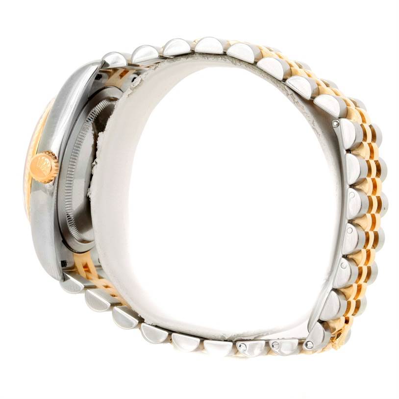 This image shows the side view of a Rolex Datejust 116233 Men's Stainless Steel Blue Dial 116233 Men's Stainless Steel Blue Dial watch, highlighting its case, crown, and two-tone bracelet.