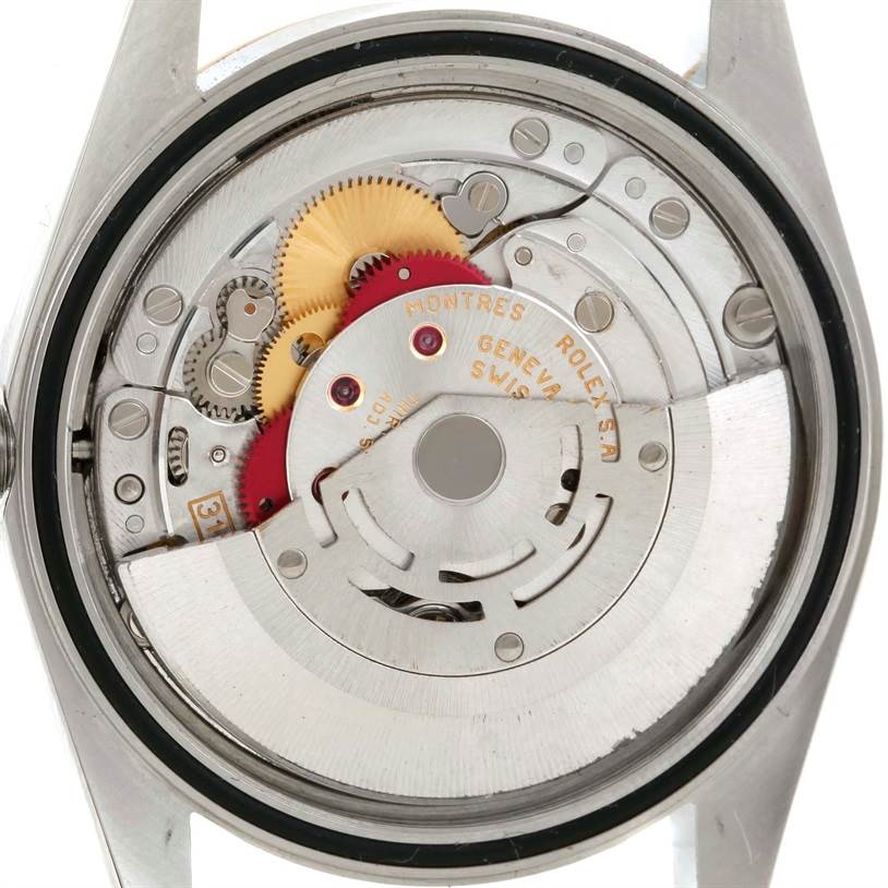 The image shows the case back of the Rolex Datejust 16233 Men's Steel and Gold (two tone) Black Dial 16233 Men's Steel and Gold (two tone) Black Dial watch, revealing its movement and internal mechanisms.