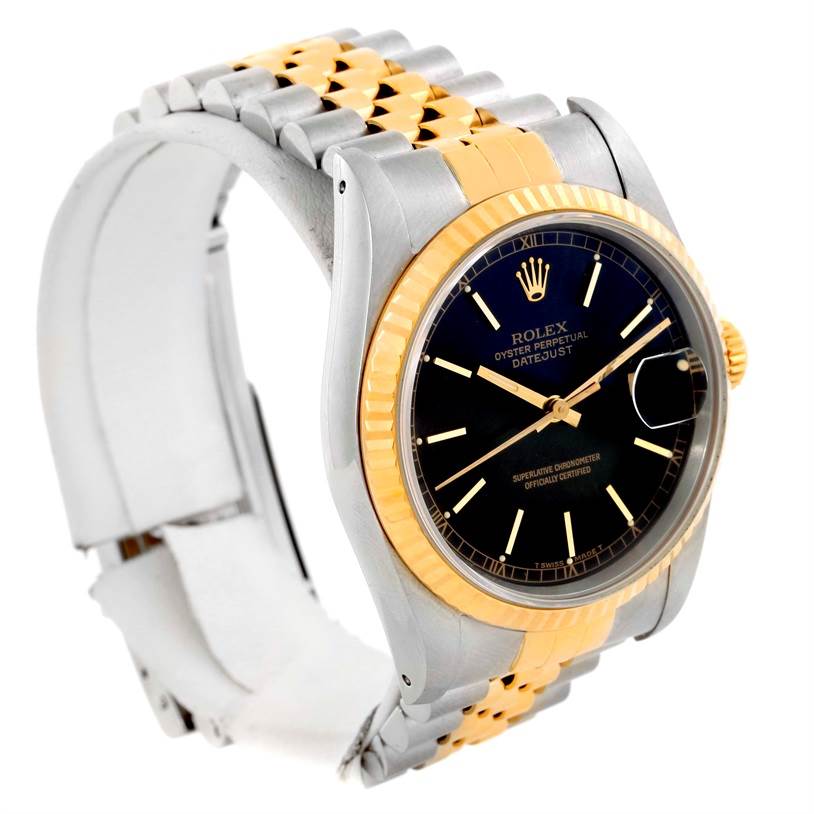 This image shows a side angle of a Rolex Datejust 16233 Men's Steel and Gold (two tone) Black Dial 16233 Men's Steel and Gold (two tone) Black Dial watch, displaying its two-tone bracelet, black dial, and fluted bezel.