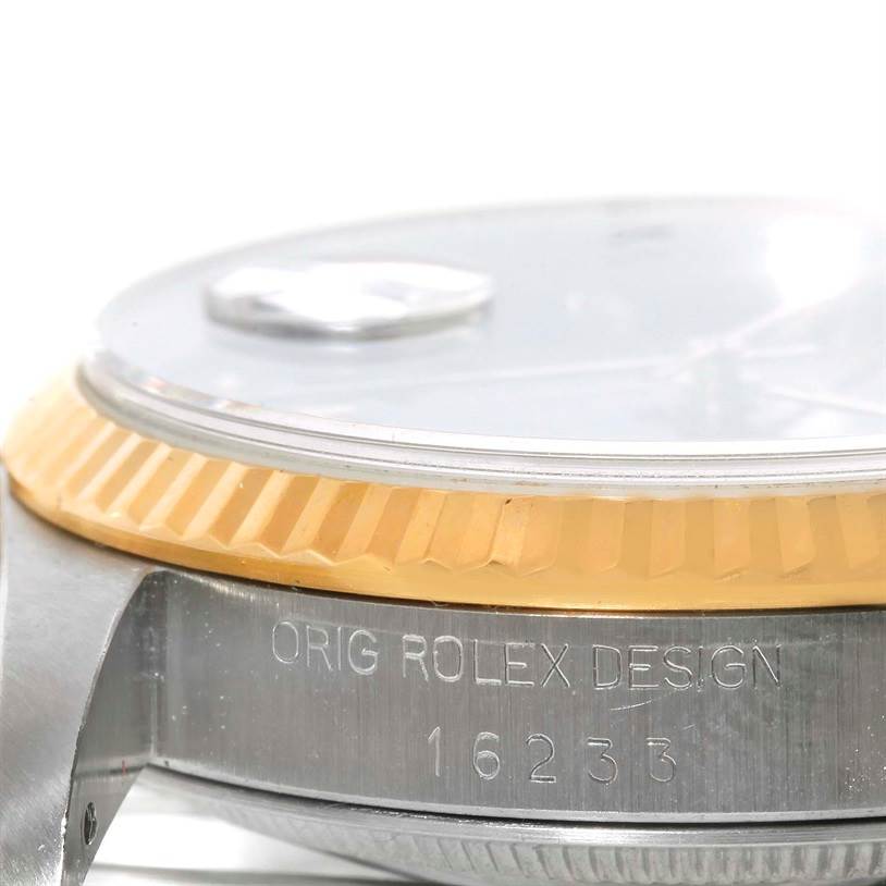 The image shows a close-up side view of the bezel and part of the case of a Rolex Datejust 16233 Men's Steel and Gold (two tone) Black Dial 16233 Men's Steel and Gold (two tone) Black Dial model, highlighting the model number.