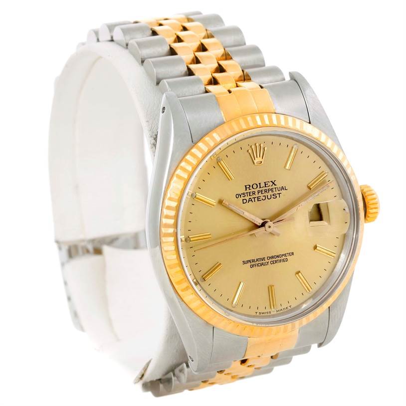 This image shows a Rolex Datejust 16013 Men's Stainless Steel Champagne Dial 16013 Men's Stainless Steel Champagne Dial watch at a three-quarter angle, highlighting the dial, bezel, and Jubilee bracelet.