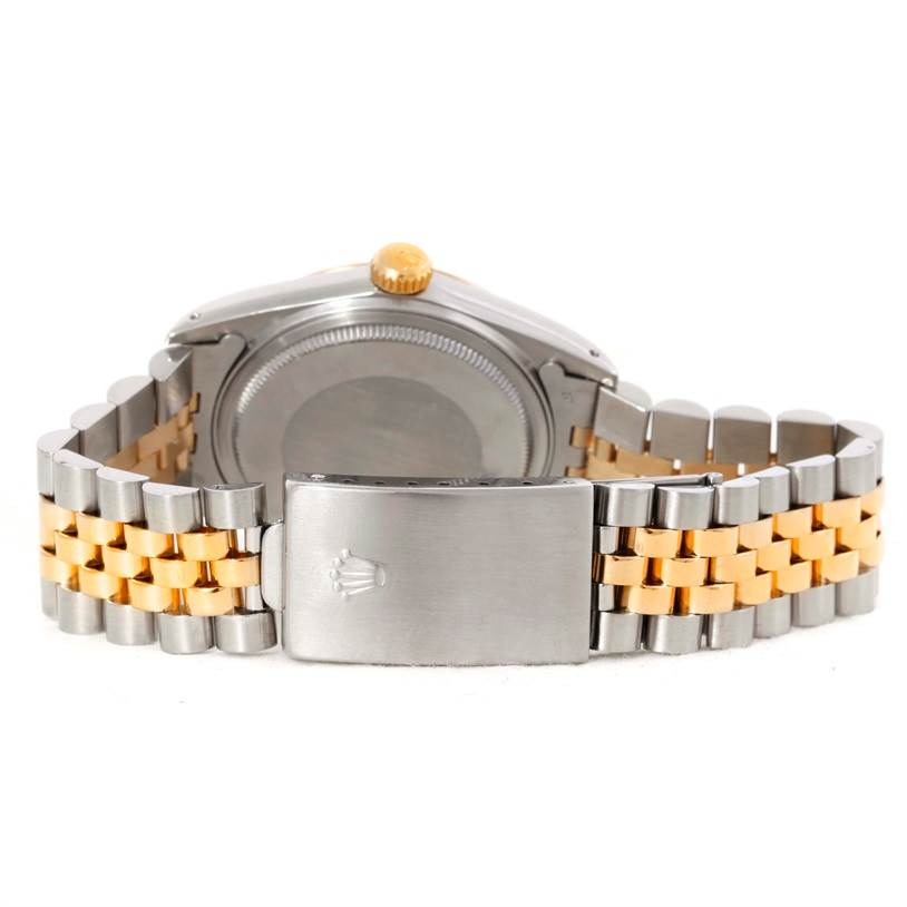 The image shows the back view of a Rolex Datejust 16013 Men's Stainless Steel Champagne Dial 16013 Men's Stainless Steel Champagne Dial watch, focusing on the case back and the two-tone Jubilee bracelet.