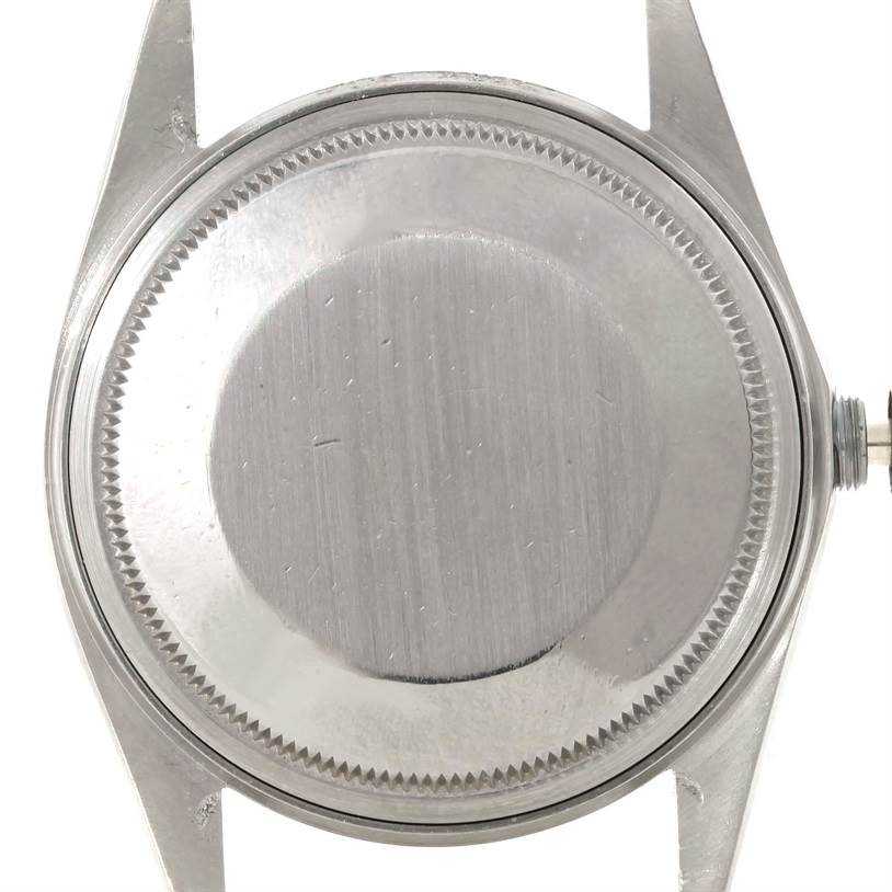 The image shows the back view and case of a Rolex Datejust 16013 Men's Stainless Steel Champagne Dial 16013 Men's Stainless Steel Champagne Dial watch.