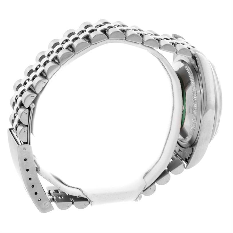 The image shows the side profile of the Rolex Datejust 16200 Men
s Stainless Steel Pink Dial 16200 Men
s Stainless Steel Pink Dial watch, focusing on the bracelet and case back.