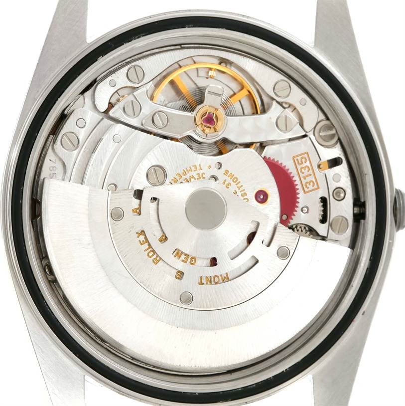 This image shows the internal mechanical movement parts of the Rolex Datejust 16200 Men
s Stainless Steel Pink Dial 16200 Men
s Stainless Steel Pink Dial watch from a back view angle.