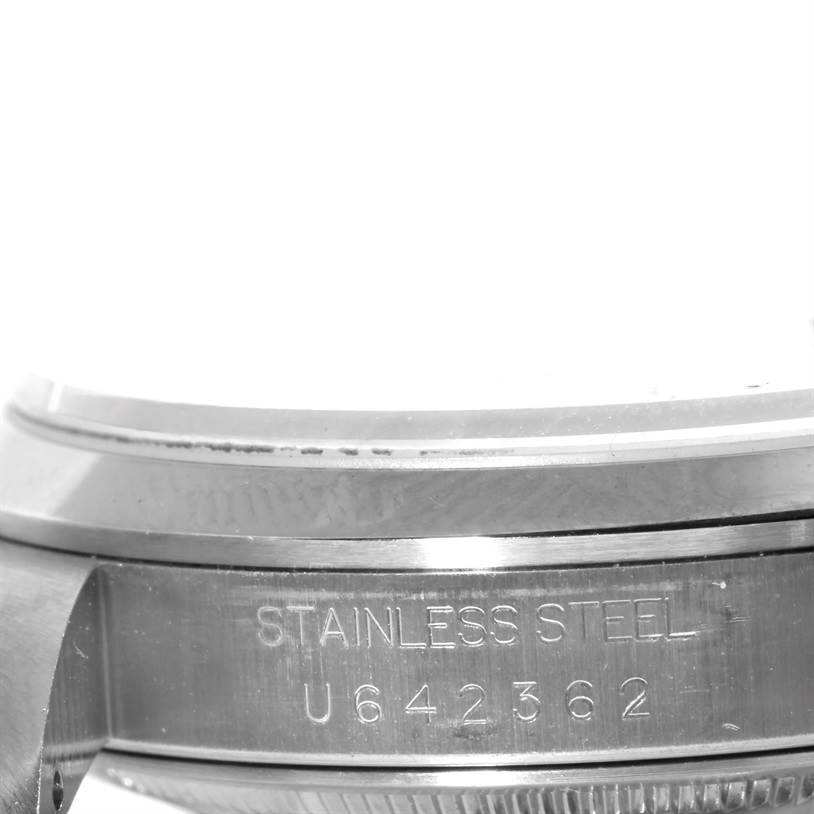 This close-up image shows the stainless steel case and serial number of a Rolex Datejust 16200 Men
s Stainless Steel Pink Dial 16200 Men
s Stainless Steel Pink Dial watch.