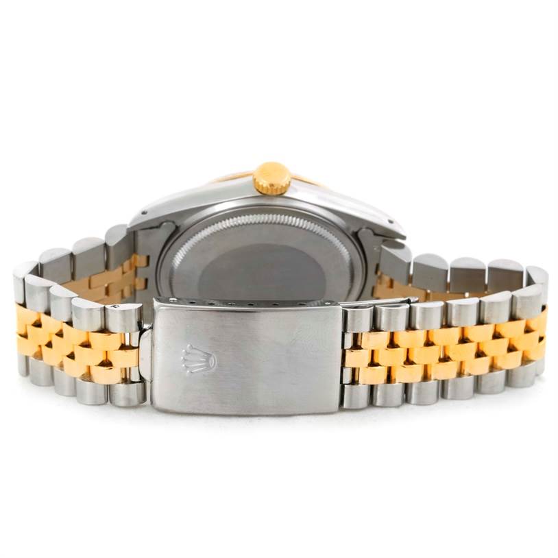 This image shows the back of a Rolex Datejust 16013 Men's Stainless Steel Champagne Dial 16013 Men's Stainless Steel Champagne Dial watch, focusing on the caseback, clasp, and two-tone bracelet.