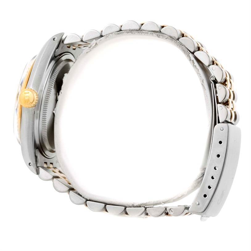 The image shows a side view of a Rolex Datejust 16013 Men's Stainless Steel Champagne Dial 16013 Men's Stainless Steel Champagne Dial watch, focusing on the crown, case, and bracelet.