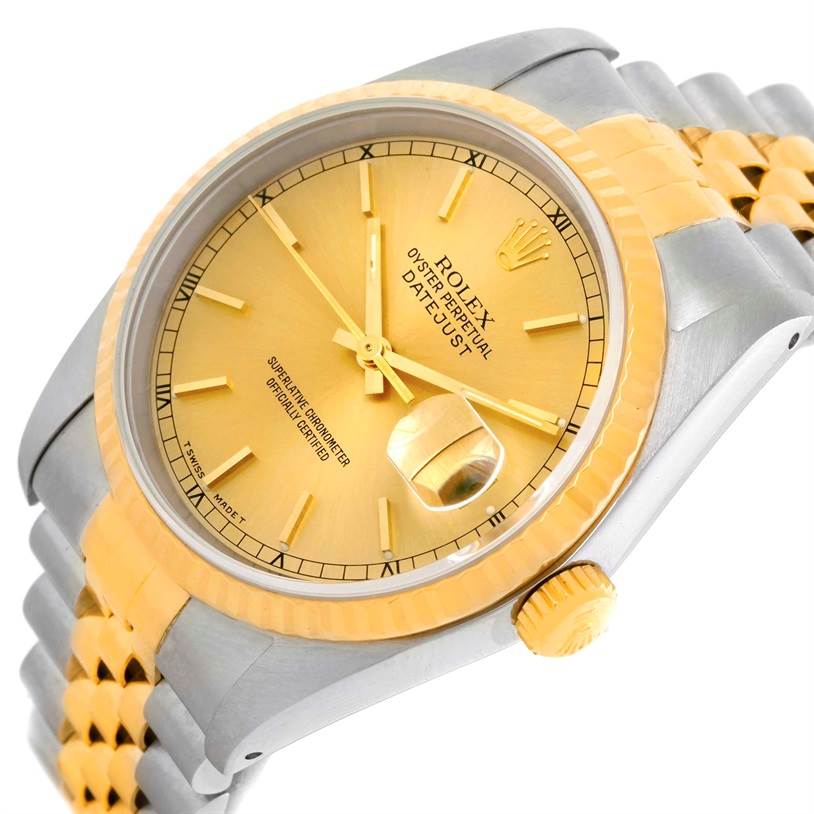 The image shows a close-up, angled view of a Rolex Datejust 16233 Men's Steel and Gold (two tone) Champagne Dial 16233 Men's Steel and Gold (two tone) Champagne Dial watch, highlighting its gold dial, bezel, and bracelet crown.
