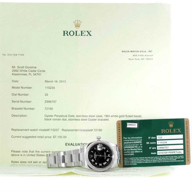 The image displays a Rolex Datejust 115234 Men
s Stainless Steel Black Dial 115234 Men
s Stainless Steel Black Dial watch from the front, accompanied by Rolex paperwork and a warranty card.
