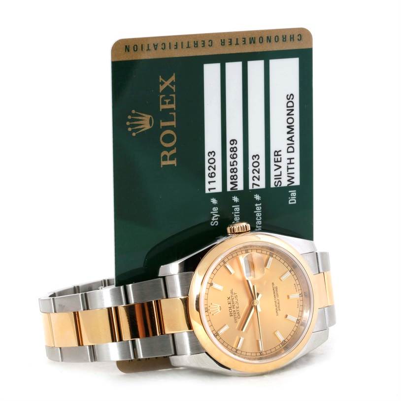 This Rolex Datejust 116203 Men
s Stainless Steel Champagne Dial 116203 Men
s Stainless Steel Champagne Dial watch is shown at a tilted angle with its dial, bezel, and bracelet visible, along with its certification card.