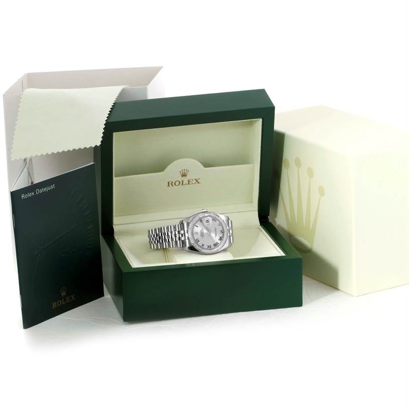 The Rolex Datejust 116234 Men's Stainless Steel Silver Dial 116234 Men's Stainless Steel Silver Dial watch is shown in its open presentation box with accompanying booklet and packaging.