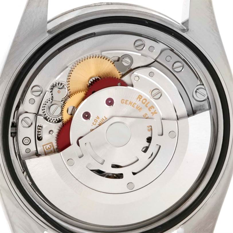 The image shows the internal mechanism or movement of a Rolex Datejust 116234 Men's Stainless Steel Silver Dial 116234 Men's Stainless Steel Silver Dial watch viewed from the back.