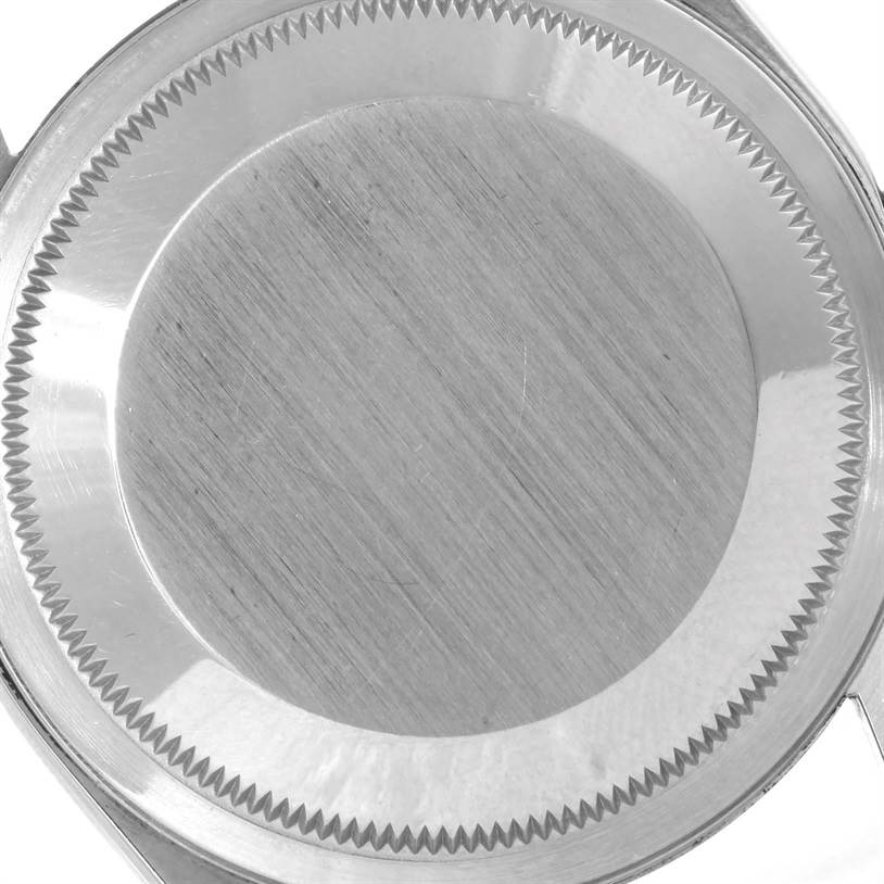 This is the back casing of a Rolex Datejust 16233 Men's Steel and Gold (two tone) Champagne Dial 16233 Men's Steel and Gold (two tone) Champagne Dial watch, shown from a top-down angle.